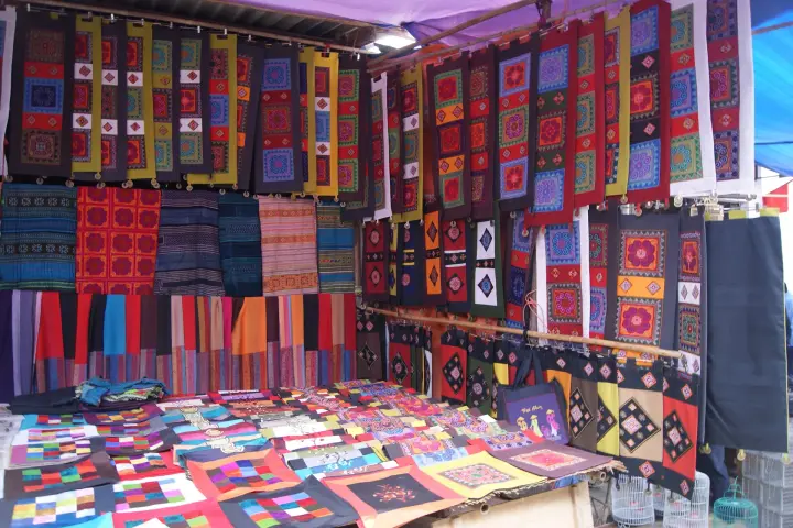 Hmong brocade and embroidery for sale at Bắc Hà market