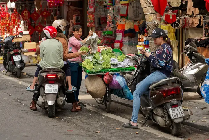 A street seller in the Old Quarter of Hanoi